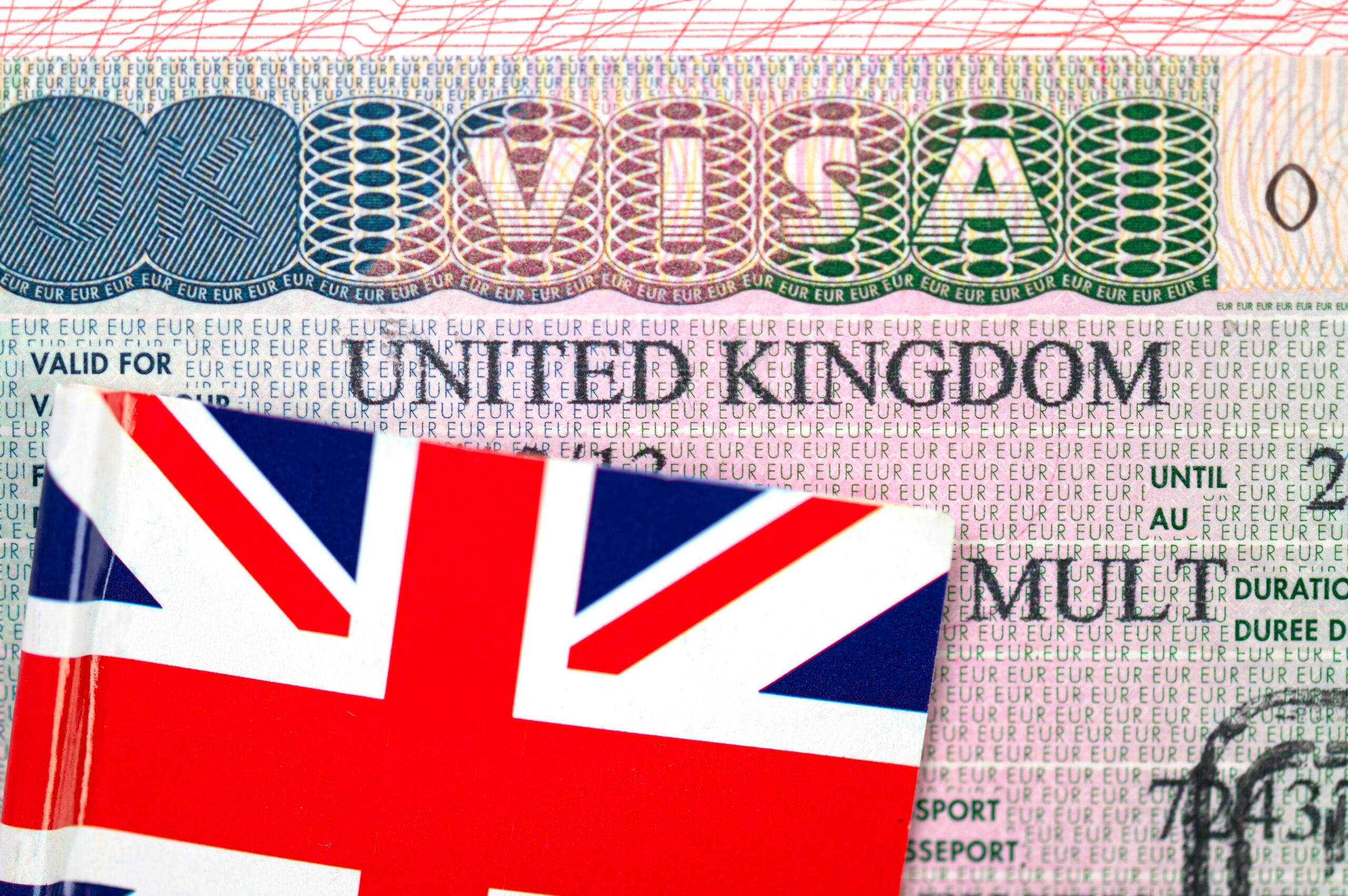 Image of a UK Visa and Union Jack flag symbolising the eVISA change